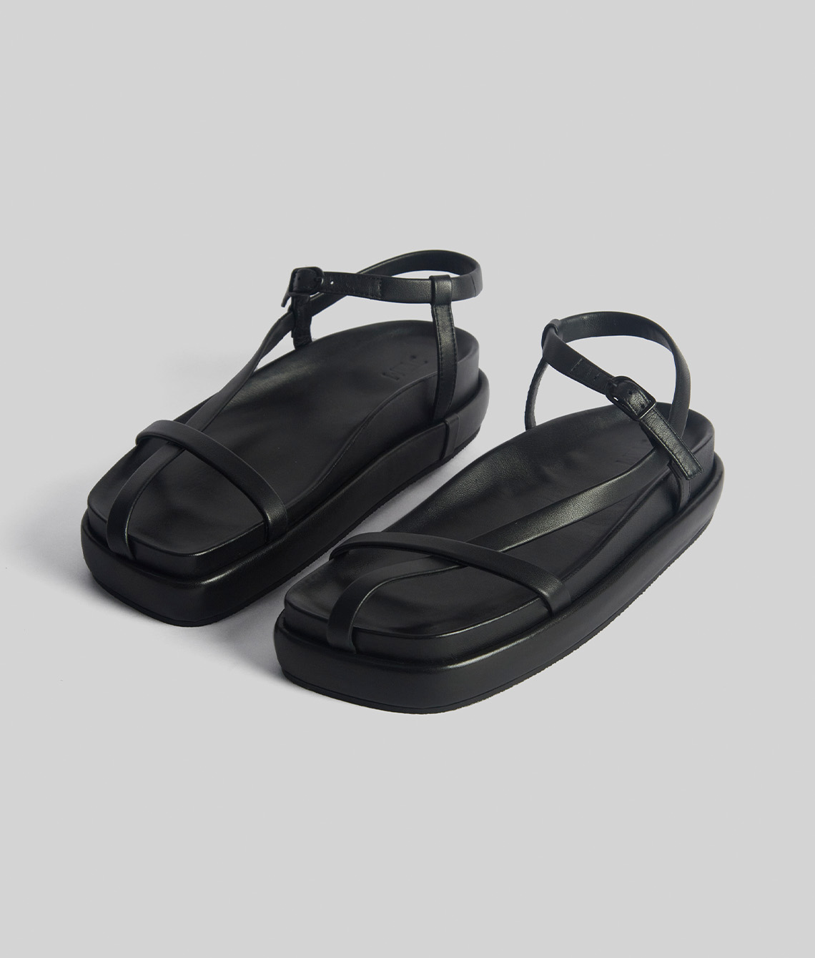 37142/ BARLY THERE ASYMETRIC STRAP FOOTBED SANDAL  